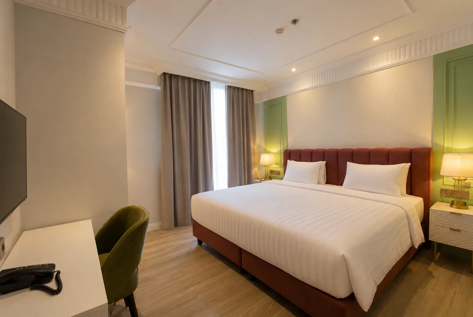 Deluxe King Room at Maia Hotel Jakarta with modern interior
